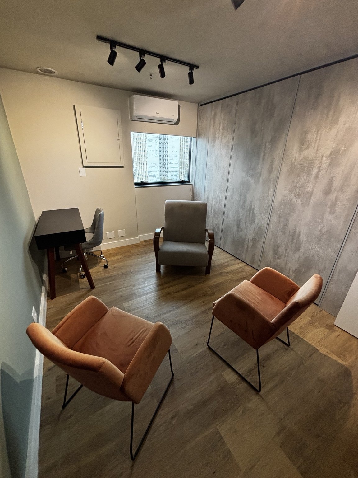 Sala de atendimento com poltronas